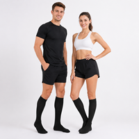 Chaussettes de compression antidérapantes 20-30 mmHg unisexes pour le voyage en avion, la course à pied, le cyclisme, soulageant la fatigue et les gonflements des jambes
