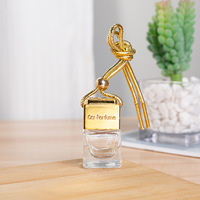 Diffuseur d'ambiance de voiture en verre mignon moderne pendentif de bouteille de parfum de luxe vide avec clip pour eau de Cologne à l'huile essentielle liquide