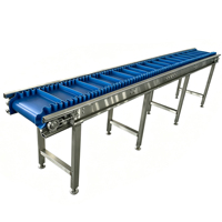 Convoyeur à bande en acier inoxydable SUS304 avec bande en PVC et protections latérales en PU pour la transformation alimentaire