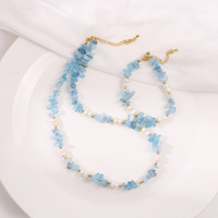 Parure de bijoux aquamarine style bohème avec collier ras-du-cou et bracelet en perles de culture d'eau douce pour femme, idéale pour le quotidien, les fêtes et les vacances