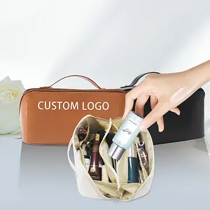Bolsa de mão para travesseiros cosméticos de viagem grande e luxuosa, bolsa de maquiagem em couro PU para mulheres, bolsa de mão portátil à prova d'água com logotipo personalizado
