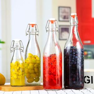 250ml 500ml 750ml 1000ml Botella oscilante para bebidas de té de vidrio transparente vacía personalizada para el hogar con tapa abatible bloqueada Venta a granel - Product Image 2