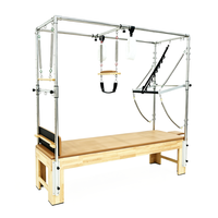 Table de Pilates Cadillac en bois de caoutchouc commercial avec coussin en PU pour la rééducation en studio