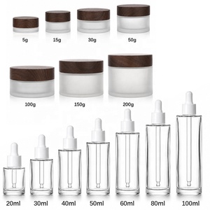 Emballage YAN Flacon compte-gouttes et pot <span class=keywords><strong>en</strong></span> <span class=keywords><strong>verre</strong></span> transparent vide de haute qualité de 50ml 100ml 100g avec couvercle <span class=keywords><strong>en</strong></span> noyer Ensemble de contenants cosmétiques - Product Image 4
