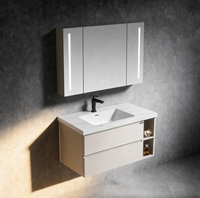 Rak Dinding Kamar Mandi Modern Warna Putih dengan Wastafel Persegi Panjang, Kabinet Cermin LED, Penyimpanan Tersembunyi, dan Dua Laci Soft Close