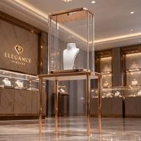 Meuble de présentation de bijoux de luxe sur mesure, tour de présentation de colliers en verre avec cadre en or rose pour boutique de centre commercial