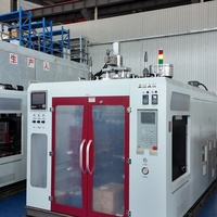 Machine de fabrication de bouteilles et de pots en plastique pour boissons et jus, par extrusion-soufflage automatique, petit modèle