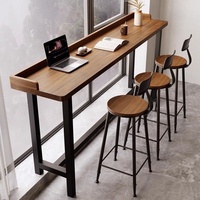Table haute en bois massif pour salons de thé et balcons, style nordique, avec chaises mobiles intégrées pour séparation de fenêtre