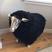 Fauteuil individuel en fibre de verre en forme de mouton, idéal pour la décoration de salon et de hall d'hôtel.