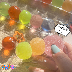 Jouet sensoriel anti-stress en forme de boule de sucre arc-en-ciel - Matériau TPR souple pour enfants - Product Image 1
