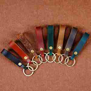Porte-clés de voiture pour homme en cuir véritable de haute qualité, durable, avec pendentif, cadeau créatif, bracelet en cuir vintage gaufré - Product Image 4