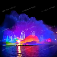 Fontaine de projection d'eau sur grand écran personnalisée avec lumière laser couleur pour projets de paysagisme nocturne et de visites panoramiques