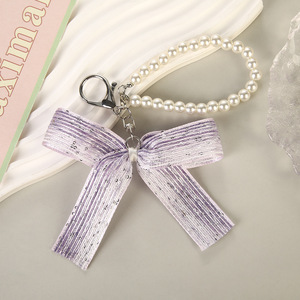 Llavero <span class=keywords><strong>de</strong></span> cadena <span class=keywords><strong>de</strong></span> perlas con lazo floral pequeño estilo coreano, set <span class=keywords><strong>de</strong></span> regalo <span class=keywords><strong>de</strong></span> 8 llaveros elegantes con lazo, dijes <span class=keywords><strong>de</strong></span> cadena <span class=keywords><strong>de</strong></span> perlas virales <span class=keywords><strong>de</strong></span> TikTok para bolsos - Product Image 4
