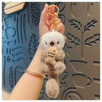 Porte-clés en peluche de loutre marine de dessin animé, doux, léger, portable, pendentif pour sac d'école, figurine mignonne pour étudiant, décoration