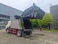 Véhicule de collecte des ordures vert Sinotruk 4x2 pour l'accès aux garages souterrains