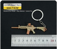 Vente en gros de 49 styles de mini-pistolets en alliage, porte-clés, modèles de pistolets de jeu, pendentifs, jouets cool pour garçons, accessoires pour sacs à dos, cadeaux d'anniversaire sûrs pour garçons