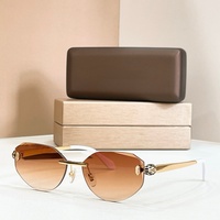 Lunettes de soleil unisexes de luxe sans monture, style designer, polarisées, en métal doré, confortables, avec décor serpent et verres dégradés