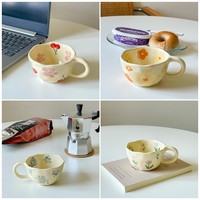 Tasse à café à fleurs peintes à la main irrégulières Ins Korea, tasse à eau de lait en céramique créative, tasse à cappuccino pour le bureau de l'hôtel