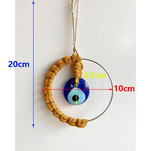 Handgewebte Baumwollfaden-Kunst: Blaues Glas-Augen-Hängedekoration mit Metallring für Diwali - Product Image 6