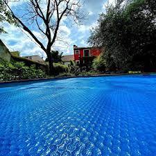 Couverture solaire durable et écologique pour <span class=keywords><strong>piscine</strong></span> avec <span class=keywords><strong>protection</strong></span> UV pour <span class=keywords><strong>piscine</strong></span> enterrée, option personnalisée en vente - Product Image 5