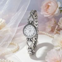 Montre-bracelet élégante pour femme JINSIY, style coréen, en acrylique, mouvement à quartz, écologique, luxe léger et tendance, en forme de cœur