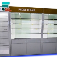 Vitrine de magasin d'accessoires pour téléphones portables personnalisée avec porte en verre pour l'affichage des coques de téléphone