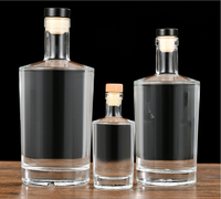 Bouteille en verre unique de 750ml, ronde et transparente, pour whisky et vodka, vente en gros