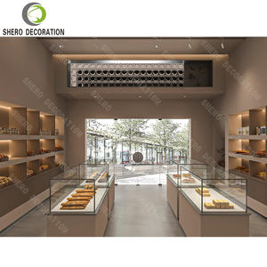 ออกแบบตกแต่งภายในร้านเบเกอรี่หรูหรา เคาน์เตอร์โชว์ขนมปัง เค้ก และของหวานทำจากกระจกคุณภาพสูง เฟอร์นิเจอร์ร้านเบเกอรี่แบบสั่งทำพิเศษสำหรับร้านค้า - Product Image 2