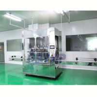 Ligne de production entièrement automatique pour le remplissage, le bouchage et l'étiquetage de bouteilles de détergent liquide