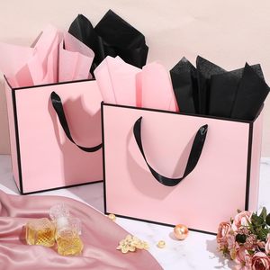 Sacs en papier kraft personnalisés en gros, écologiques, de haute qualité, en matériaux recyclés, durables, pour l'emballage de vêtements et les sacs de shopping - Product Image 2