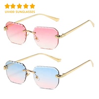 Nouvelles arrivées de lunettes sans cadre de marque de mode de haute qualité Designer de luxe femmes coupe de diamant lunettes de soleil teintées roses sans monture