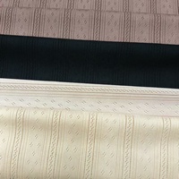 Nouveau tissu jacquard en polyester populaire 210gsm tissu tricoté confortable et respirant pour pyjamas et robes