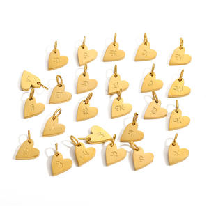 Dijes con Iniciales de Corazón |   Colgantes de Letras del Alfabeto en Acero Inoxidable con Baño de Oro PVD de 18K |   Sin Deslustre, Resistente al Agua e Hipoalergénico - Product Image 1