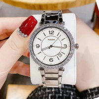 Montre élégante pour femmes, boîtier rond en cristal, cadran en nacre, date, bracelet en acier inoxydable, lunette en strass, montre-bracelet pour dames
