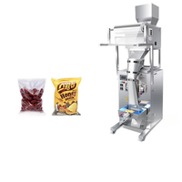 Machine d'emballage entièrement automatique pour le conditionnement de poudres et granulés, le scellage de sachets de thé, la poudre médicinale, les noix, et le pesage et l'emballage d'aliments pour animaux.