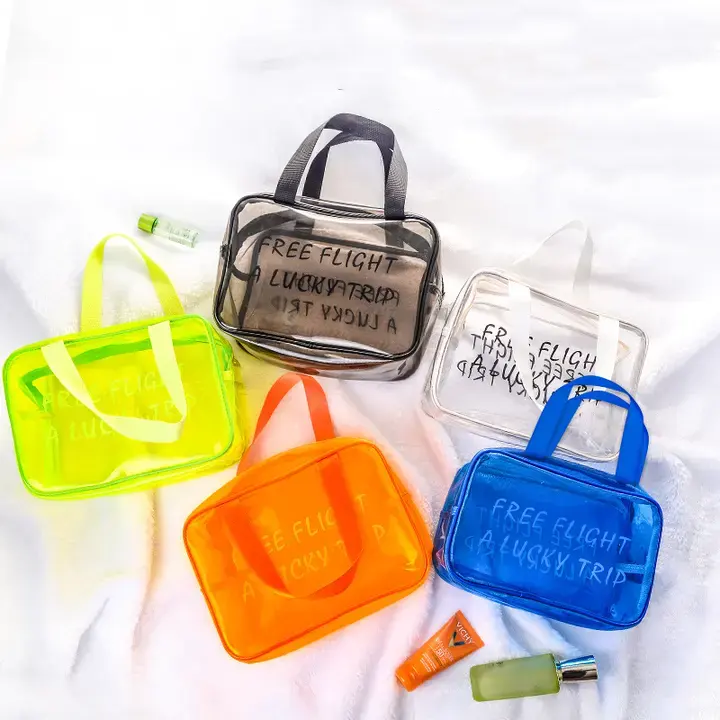 कस्टम लोगो कैंडी रंग जेली नारंगी यात्रा पीवीसी स्पष्ट कॉस्मेटिक पाउच भंडारण जिपर मेकअप बैग हैंडल के साथ