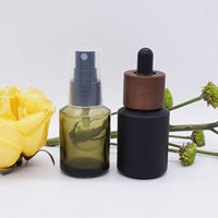 Bouteille compte-gouttes de 30ml en porcelaine, 1oz, épaule inclinée, vert olive, blanc, noir avec couvercle de Texture en bois foncé