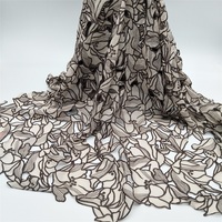 Tissu en dentelle brodé au laser à deux couleurs, motif feuille, de haute qualité, en stock usine, à prix abordable, pour vêtements, échantillon gratuit disponible