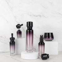 Ensemble d'emballage cosmétique fantaisie bouteille de lotion 120ml 100ml 50ml avec pompe de pulvérisation noire et couvercle noir pot de crème 50g 30g pompe de pulvérisation