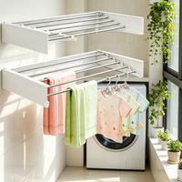 Lavinia – Support mural rétractable moderne et durable en acier inoxydable noir, pliable à trois niveaux, multifonctionnel pour cuisine et vêtements