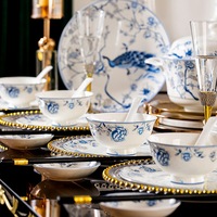 Ensemble de bol en céramique en porcelaine bleue blanche cadeau de ménage os chinois Chine bol de paon bleu et assiette ensemble de vaisselle