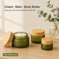 Best-seller, pot de crème pour le visage recyclable fabriqué en usine OEM, 15/30/50/100g, pot en verre cosmétique avec couvercle en bambou