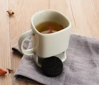 Mug à café en céramique en forme de visage humain avec compartiment pour biscuits et gâteaux