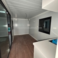 Skyacross2602 Changxu Maisonnette Préfabriquée Mobile Autonome Verte en Bois, Maison Modulaire Portable de Type Conteneur 20 Pieds
