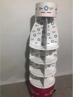 Présentoir de boissons rotatif à 360 ° personnalisé support de bouteille d'eau mobile à plusieurs niveaux avec roues pour supermarché de détail