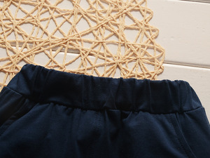 เสื้อผ้าเด็กขายส่ง ชุดเสื้อโปโลสีเหลือง กางเกงขาสั้นสีดำสำหรับเด็กผู้ชาย - Product Image 6