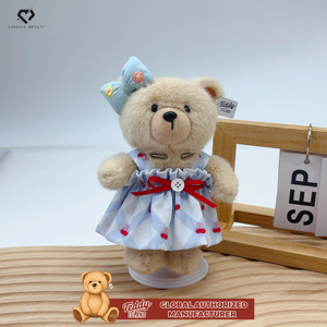 Teddy ISLAND Giocattolo di Peluche Carino con Autorizzazione Globale, Gonna Floreale Bianca, Accessori con Fiocco e Cordino Blu - Product Image 6