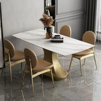 Ensemble de table à manger de luxe en marbre rectangulaire avec base dorée en acier inoxydable en forme de C, design moderne, fabrication sur mesure en Italie