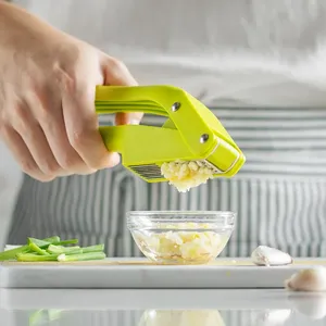 Multifunctional Plastic Garlic Press and Peeler 2 in 1 Manual Kitchen <b>Tool</b> with Wide Handle and Double Slot Chopper Mincer - Product Image 2