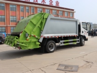 Camion compacteur de déchets à chargement arrière manuel FAW Jiefanghu VH 4x2 - 8-12 mètres cubes pour une collecte efficace des déchets municipaux